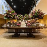 flowers and cake on table